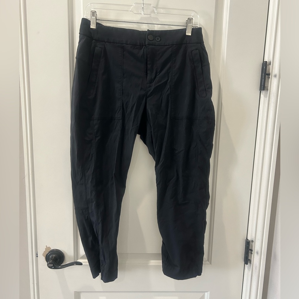 Athleta Black Trekkie pant. Size 12. Snap front style. EUC.